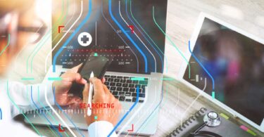 Doctor using smartphone and laptop with digital health interface overlay, representing continuous glucose monitoring technology