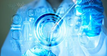 Laboratory scientists conducting advanced biomedical research in the UK