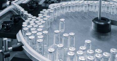 Sanofi acquisition of Dynavax vaccine manufacturing vials on automated production line