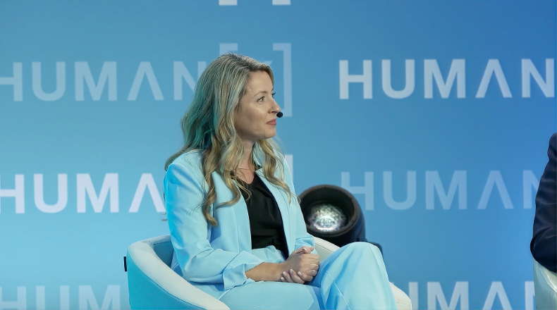 Dr Maria Dunford, CEO and co-founder of Lifebit, speaking at a healthcare event