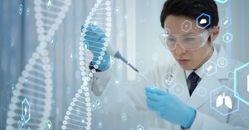 Scientist using a pipette with digital DNA and health data graphics